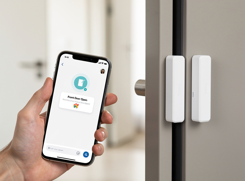 Smart door sensor installed on front door frame