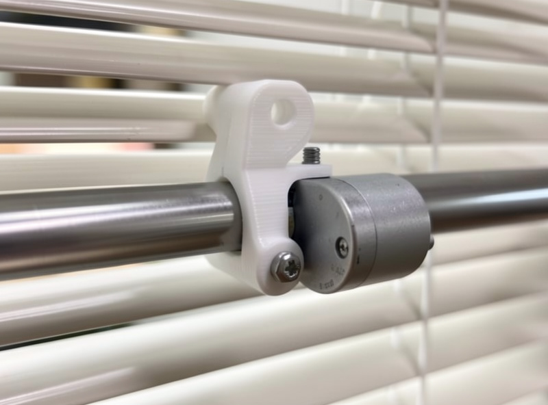 3D-printed bracket and coupler mounting a small motor to a venetian blind tilt mechanism